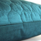 Coussin matelassé Halo bleu sarcelle