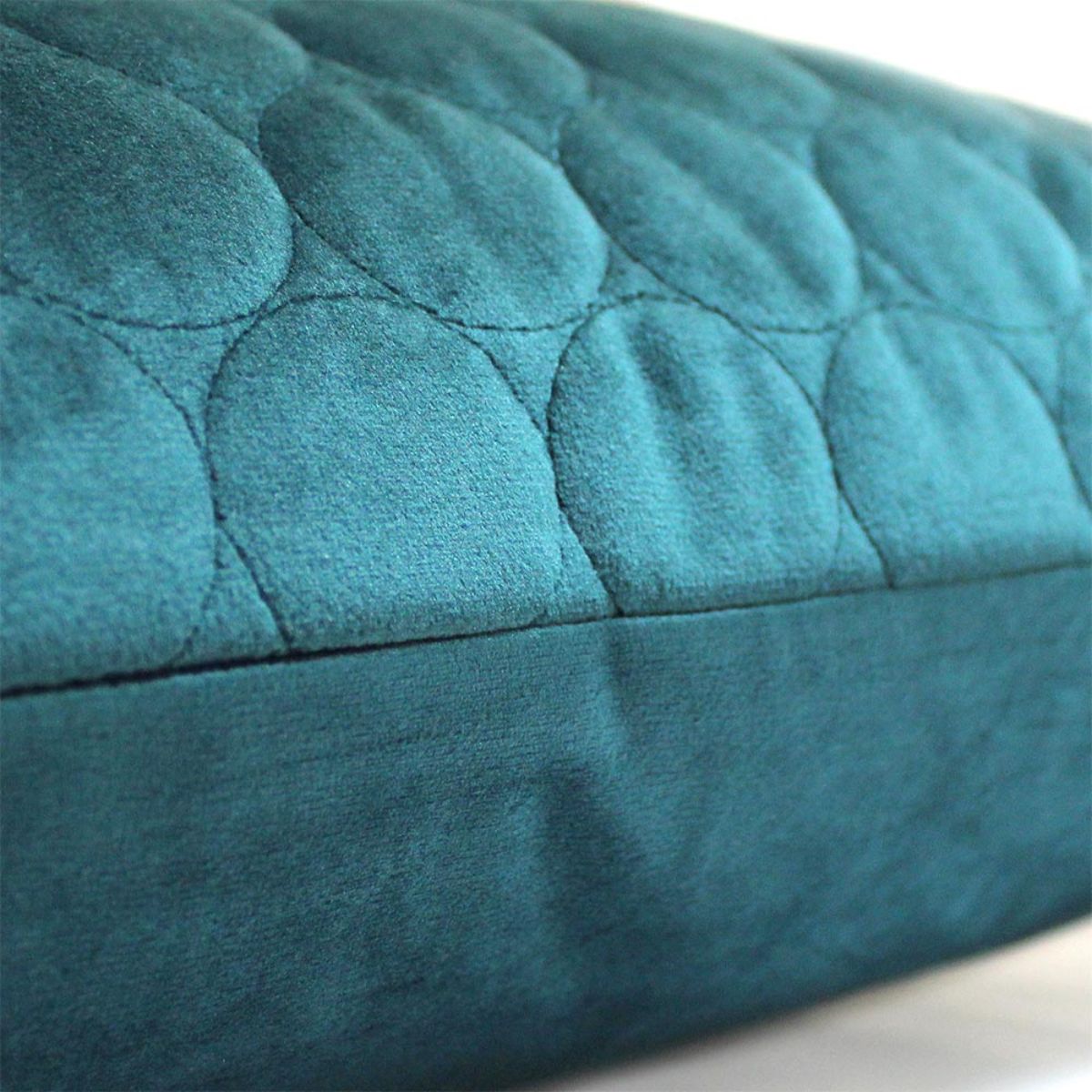 Coussin matelassé Halo bleu sarcelle