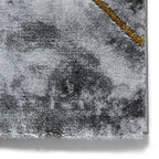 Tapis géométrique artisanal ivoire et or