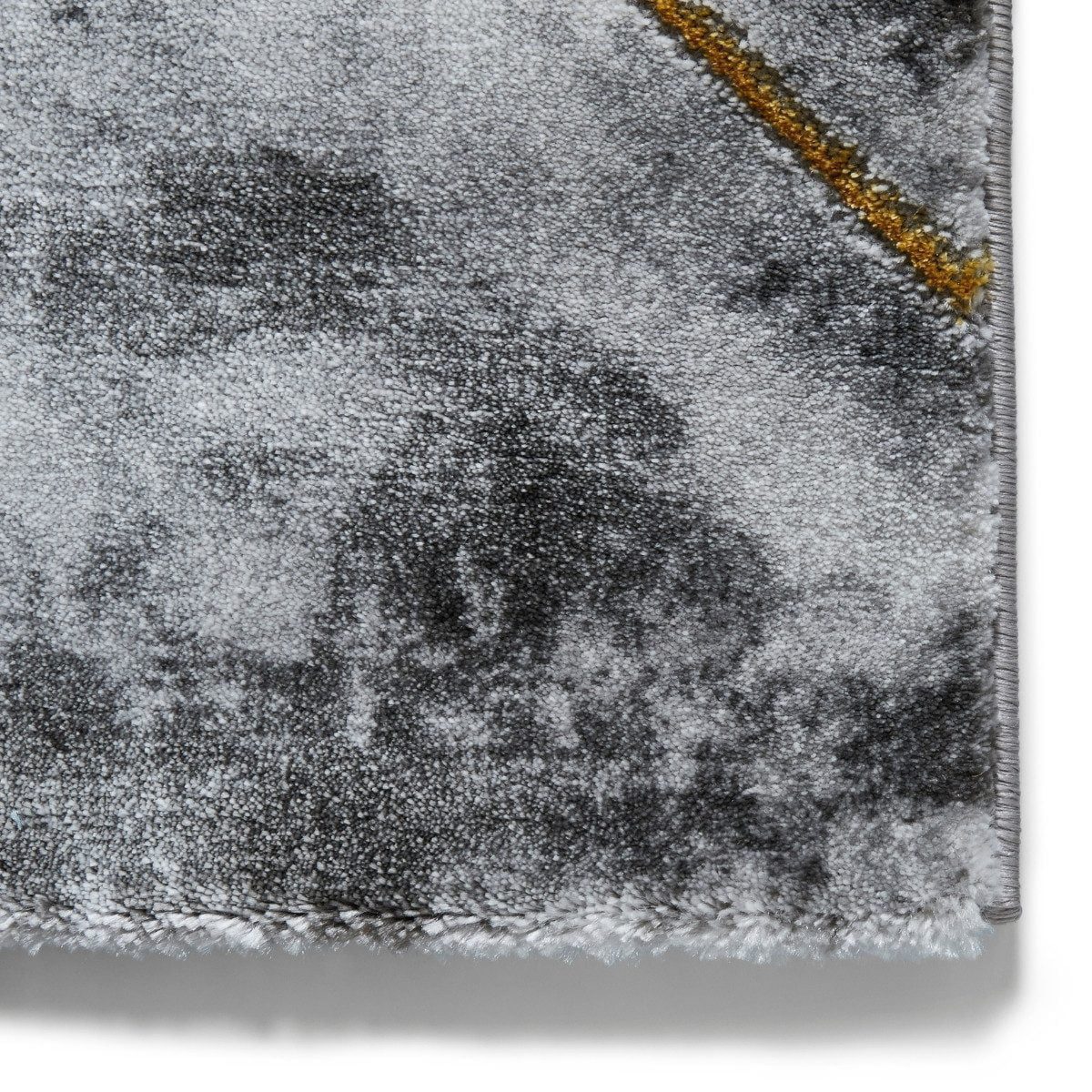 Tapis géométrique artisanal ivoire et or