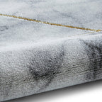 Tapis géométrique artisanal ivoire et or