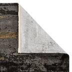 Tapis abstrait noir et or artisanal