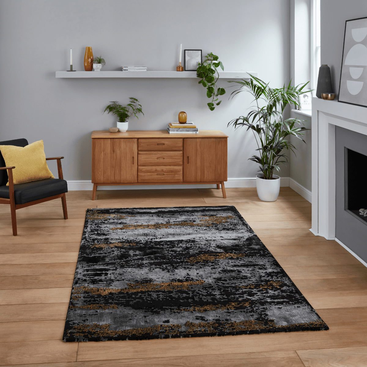 Tapis abstrait noir et or artisanal
