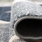 Tapis géométrique Mason Blue à quatre quadrants