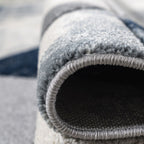 Tapis Mason Blue à motif triangulaire texturé