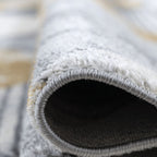 Tapis Mason à motif triangulaire moutarde et gris