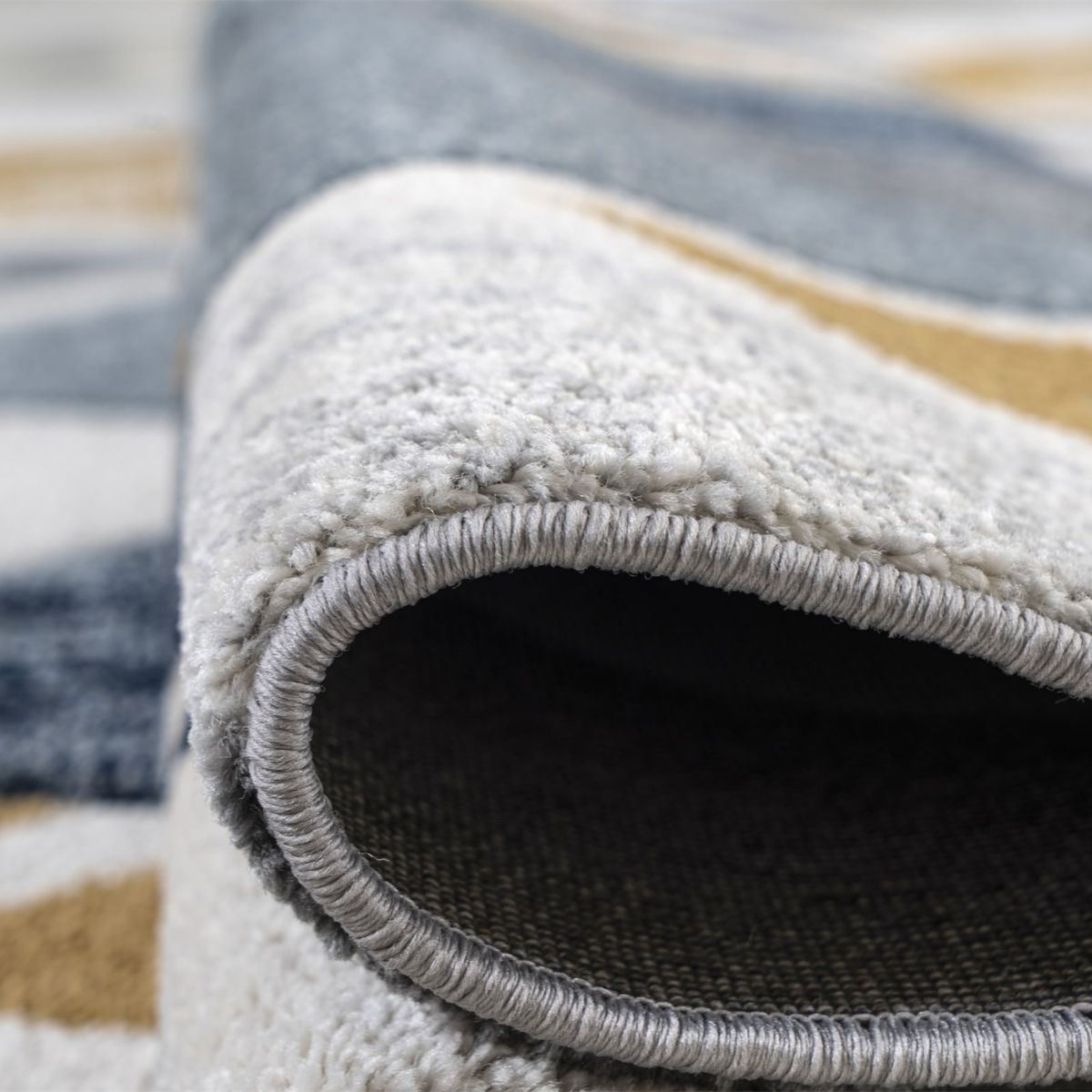 Tapis Mason à chevrons bleu marine