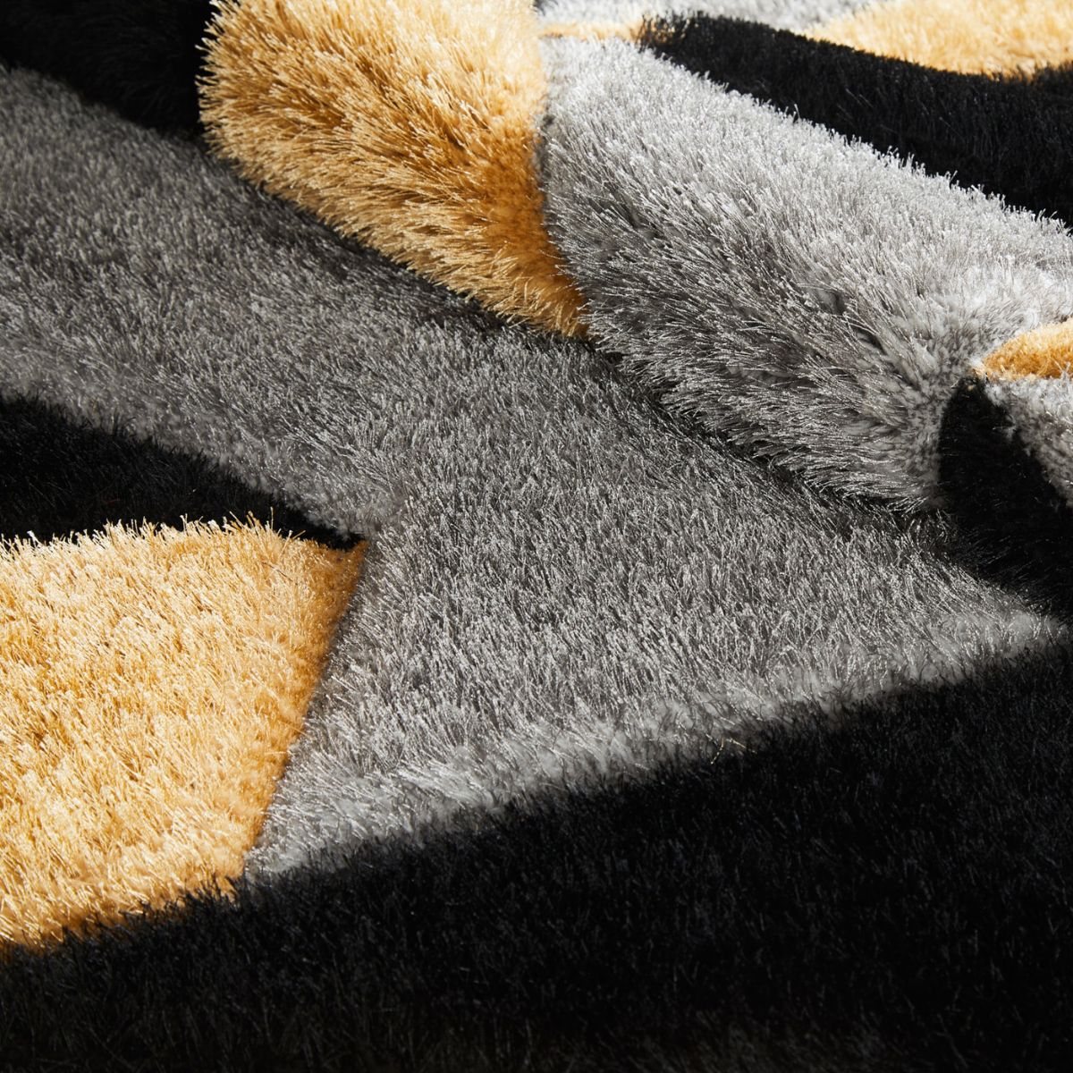 Tapis géométrique Pluton gris et or