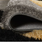 Tapis géométrique Pluton gris et or