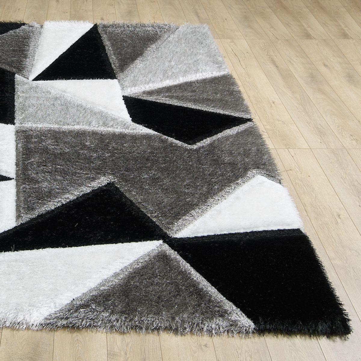 Tapis géométrique noir et blanc Pluton