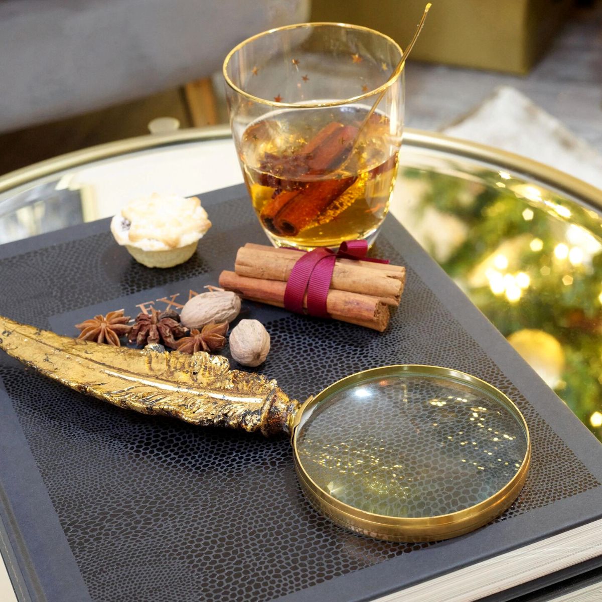 Loupe de poche en plumes d'or