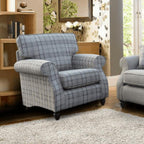 Fauteuil à accoudoirs roulés Edel