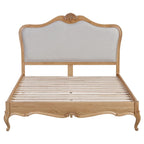 Cadre de lit Versailles en chêne sculpté avec tête de lit rembourrée